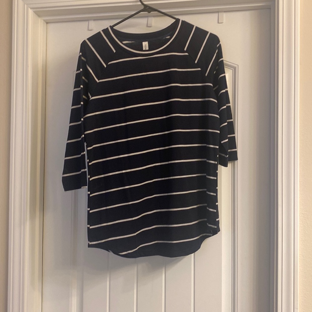 Tickled teal striped three quarter sleeve top.